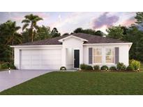 Single-story home with two-car garage and landscaped lawn at 437 Baltic Ct, Poinciana, FL 34759