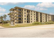 Seabridge North condo building, featuring multiple floors and balconies at 3170 Ocean Shore Blvd # 305, Ormond Beach, FL 32176