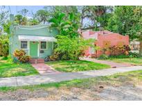 Two charming bungalow homes with lush landscaping at 321 Cedar St, Daytona Beach, FL 32114