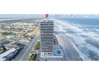 Oceanfront high rise building, pool, and parking at 2200 N Atlantic Ave # 1602, Daytona Beach, FL 32118