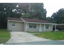 Ranch-style house with a spacious yard at 118 Deacon Jones Blvd, Orlando, FL 32810