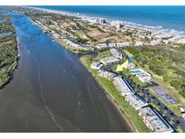 Aerial view of Ocean Palm Villas South, situated between the Halifax River and the Atlantic Ocean at 53 Ocean Palm Villa S # 53, Flagler Beach, FL 32136