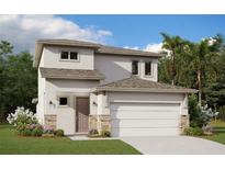 Two-story house with a light-colored facade, attached garage, and landscaping at 2241 Juniper Berry Dr, Minneola, FL 34715