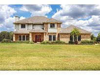 Two-story brick home with large yard at 29334 David Ct, Tavares, FL 32778