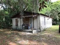 Small, single-story house needing renovations at 1605 Rose Ln, Eustis, FL 32726