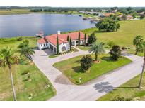 Luxury waterfront home with large backyard and pool at 7616 Lily Ct, Groveland, FL 34736