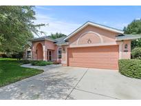 Charming one-story home with a two-car garage at 36649 Sundance Dr, Grand Island, FL 32735