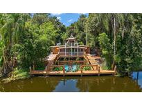 Unique waterfront home with private dock and deck at 507 Lakeshore Dr, Eustis, FL 32726