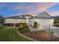 Single-Gathering home with landscaped yard and two-car garage at 8505 Se 168Th Kittredge Loop, The Villages, FL 32162