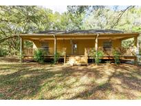 Ranch-style house with front porch at 9442 Cr 674, Bushnell, FL 33513