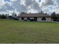 Ranch style home with large yard and RV parking at 26650 Pelican St, Eustis, FL 32736