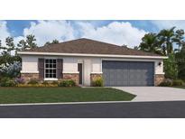 One-story home with gray garage door and brown roof at 2986 Supermarine Rd, Tavares, FL 32778