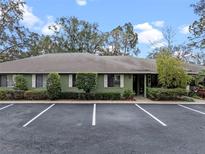 Green house exterior with parking and landscaping at 636 Mount Homer Rd # 636, Eustis, FL 32726