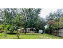 Charming home with spacious backyard and shed at 14468 Ne 204Th Ln, Fort Mc Coy, FL 32134