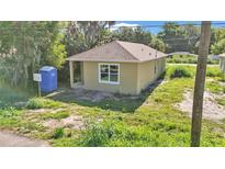 Newly constructed light tan single-Gathering home at 1033 Lakewood Ct, Lakeland, FL 33801