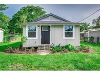 Charming craftsman style home with a freshly landscaped lawn at 2529 Weber St, Lakeland, FL 33801
