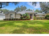 Beautiful home with well-maintained landscaping at 6529 Longwood Trace S Ln, Lakeland, FL 33811