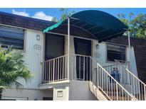 Building exterior showing entrance and stairs at 6128 Topher Trl # 6128, Mulberry, FL 33860