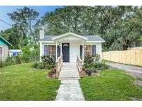 Charming bungalow with a welcoming front porch and landscaped yard at 2429 Lakeview St, Lakeland, FL 33801