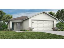 One-story home with attached garage and landscaped lawn at 1843 Daystar Dr, Haines City, FL 33844