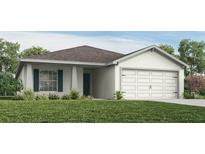 One-story home with a two-car garage and landscaped lawn at 721 Bayside Blvd, Winter Haven, FL 33881
