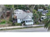 Aerial view of a charming bungalow-style home at 607 N Dixie Fwy, New Smyrna Beach, FL 32168