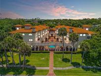 Luxury waterfront community at sunset at 5090 Riverside Dr # 105, Port Orange, FL 32127