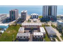 Aerial view of beachside condos near the ocean at 3750 S Atlantic Ave # 180, Daytona Beach Shores, FL 32118