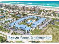 Aerial view of Beacon Point Condominium complex and beach at 4590 S Atlantic Ave # 263, Ponce Inlet, FL 32127