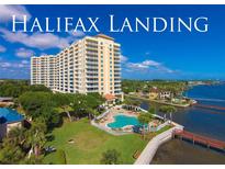 Luxury condo building with pool and waterfront views at 2801 S Ridgewood Ave # 1215, South Daytona, FL 32119