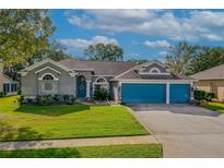 Charming single-Gathering home with a two-car garage and lush green lawn at 3769 Fiano Dr, Port Orange, FL 32129