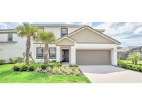 Two-story house with two-car garage at 330 Ballo Dr, Kissimmee, FL 34746