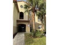 Condo building with landscaping and parking at 824 Camargo Way # 106, Altamonte Springs, FL 32714