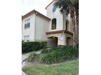Well-maintained building exterior with landscaping and convenient access at 822 Camargo Way # 101, Altamonte Springs, FL 32714