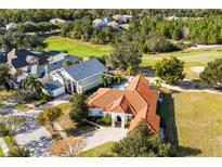 Luxury home with pool and golf course views at 7487 Gathering Dr, Reunion, FL 34747