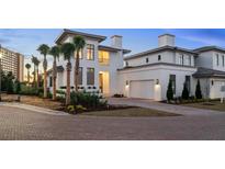 Luxury two-story home with modern design and brick driveway at 4174 Grande Brick Loop # 25, Orlando, FL 32837