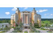 Luxury high-rise building with resort-style amenities and scenic views at 7593 Gathering Dr # 505, Reunion, FL 34747