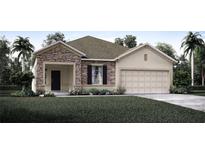 Charming one-story home with stone accents and a two-car garage at 1677 Andover Ridge Dr, Deland, FL 32720