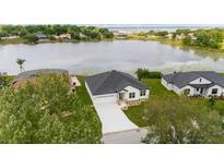 Lakefront property with backyard at 10625 Summit Lakes Ln, Clermont, FL 34711