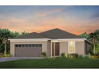 One-story home with two-car garage and attractive landscaping at 1953 Spring Shower Cir, Kissimmee, FL 34744