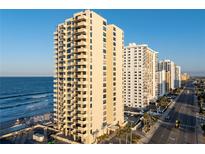 Oceanfront building exterior with parking at 2987 S Atlantic Ave # 606, Daytona Beach Shores, FL 32118