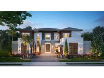 Luxury two-story home with modern design and landscaping at 11027 Cromwell Rd, Orlando, FL 32827