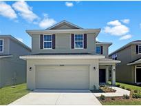 Two-story house with a two-car garage at 3690 Sagefield Dr, St Cloud, FL 34773