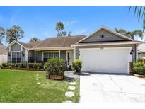 One story home with attached garage at 3229 Clewiston St, Deltona, FL 32738
