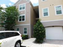 Building exterior showcasing the entrance and parking at 3480 Soho St # 101, Orlando, FL 32835
