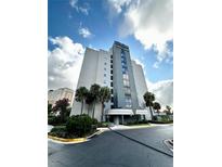 Exterior view of a high rise building at 6165 Carrier Dr # 3802, Orlando, FL 32819