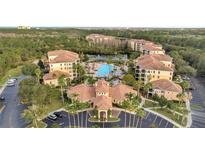 Luxury condo community with resort-style pool, clubhouse, and ample parking at 8801 Worldquest Blvd # 4406, Orlando, FL 32821