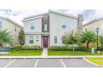 Modern two-story home with landscaping at 4562 Narrative Ln, Kissimmee, FL 34746