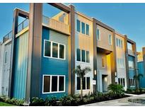 Modern three-story building with contemporary design at 7740 Sandy Ridge Dr # 234, Reunion, FL 34747
