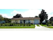 Exterior front view of a charming single story home at 695 Florida Pkwy Pkwy, Kissimmee, FL 34743